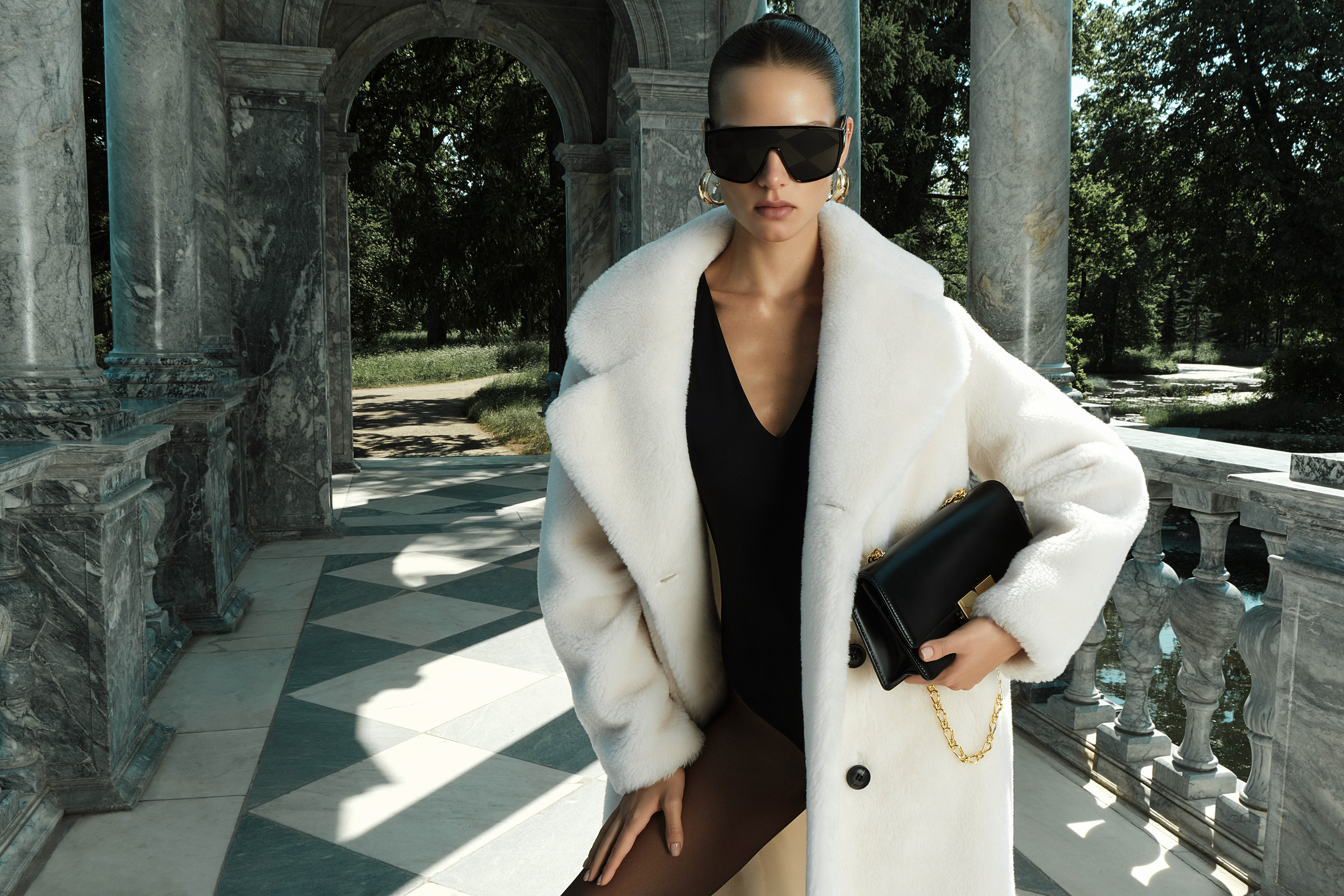 Models wearing sculptural couture looks